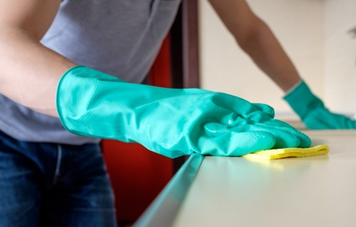 Detailed kitchen and bathroom cleaning during a Harrow move in service