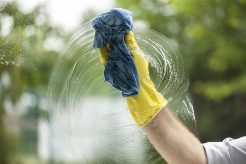 Cleaner preparing a kitchen and living area in Harrow